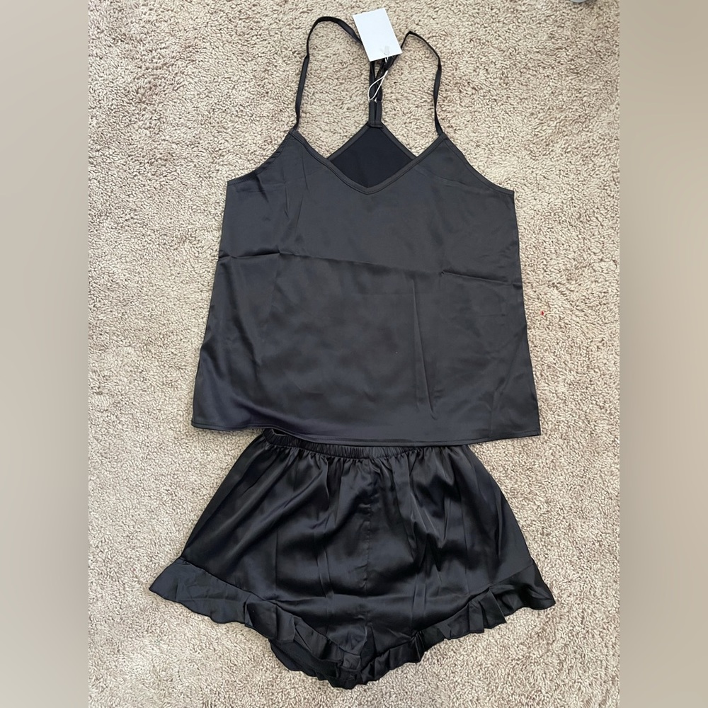 Black satin pajama set never worn.